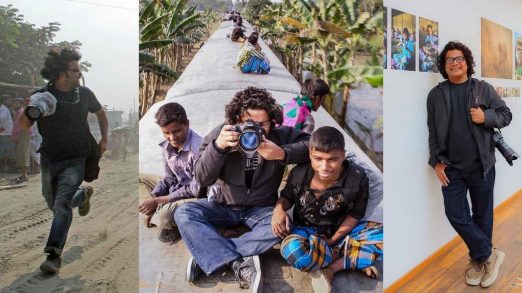 GMB Akash interacting with a group of smiling children in a rural village, holding his camera, symbolizing the connection between the storyteller and the community.