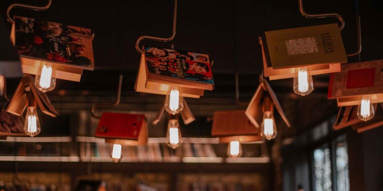 Cozy bookstore café interior with books and lighting