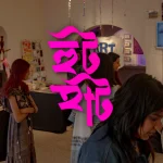 Attendees browse independent art and craft displays at a Hoot Haat NYC Bengali creative market in Queens